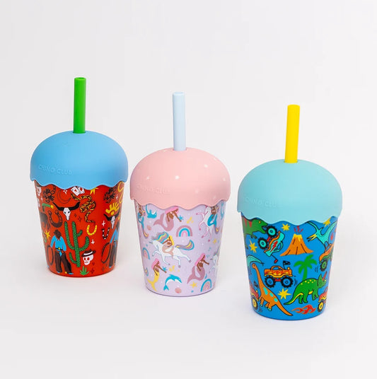 trio of reusable smoothie cups with straws in cowboy, mermaid unicorn and dinosaur monster truck design