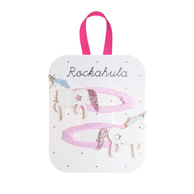 two unicorn hair clips with Rockahula packaging