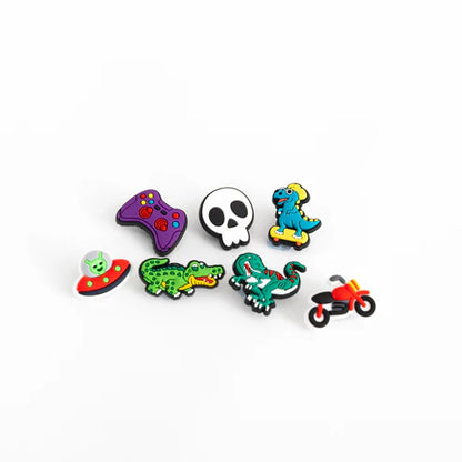 Set of colorful charms featuring various designs on a white background