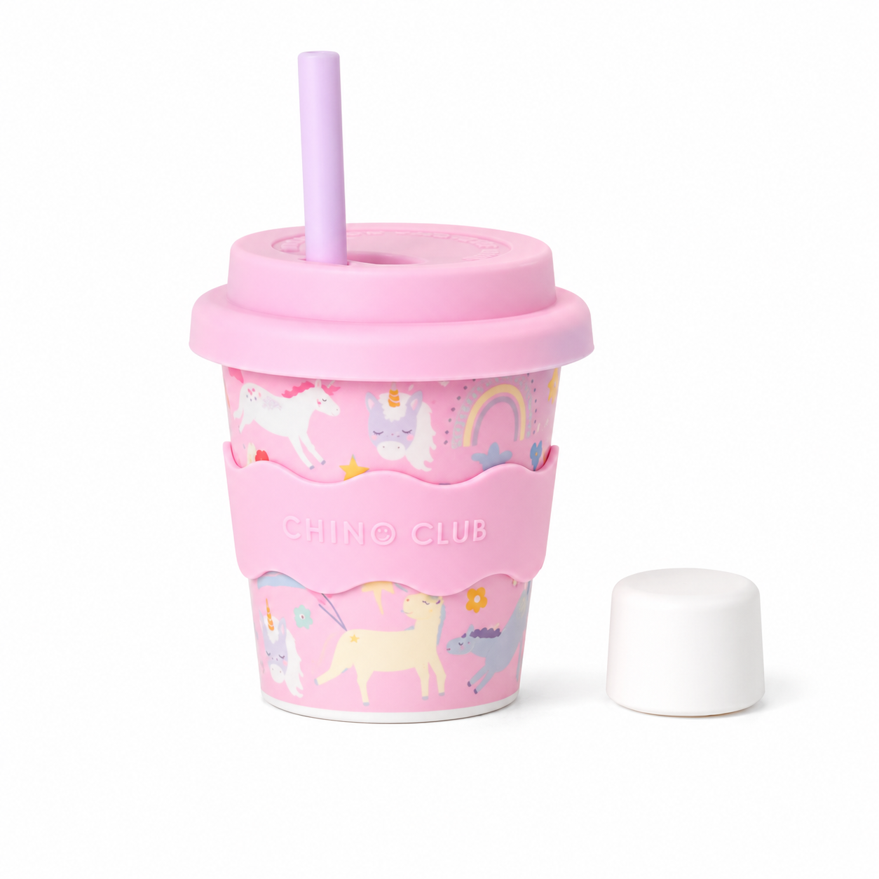 Pink unicorn reusable 4oz babychino cup with silicone lid, stopper straw and matching silicone sleeve by CHINO CLUB.