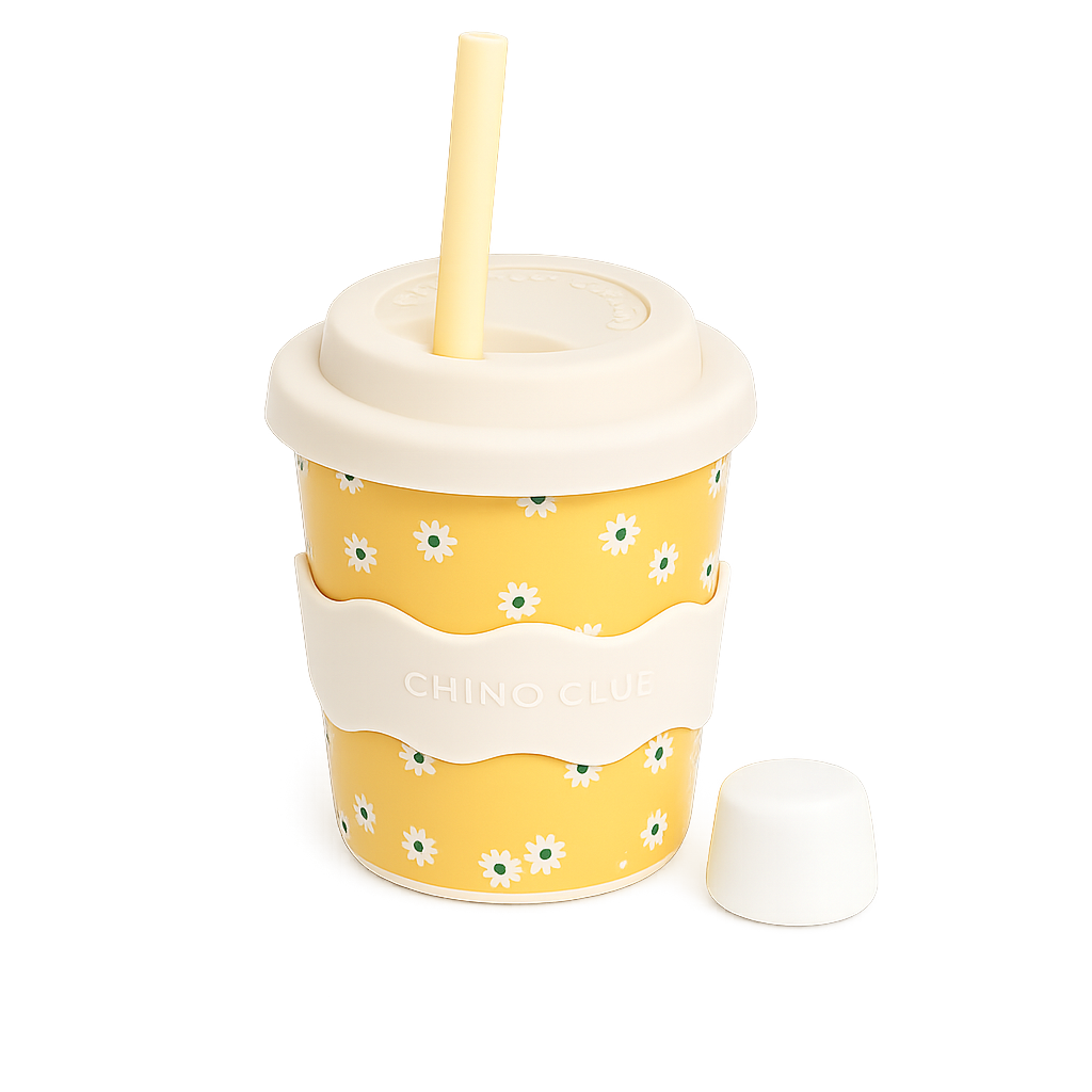Yellow Daisy reusable 4oz babychino cup with silicone lid, stopper straw and matching silicone sleeve by CHINO CLUB.